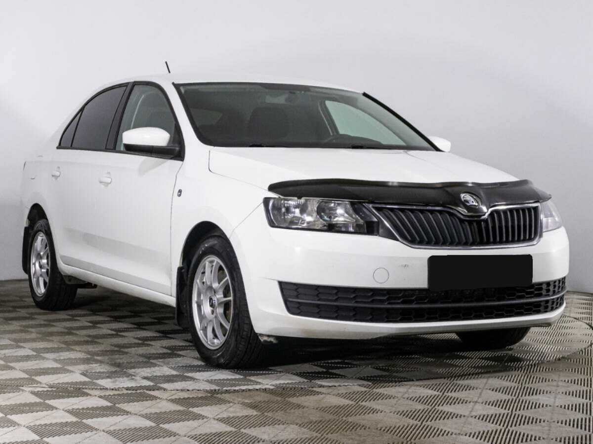 Skoda Rapid с пробегом — 2014 год. Фото: #2