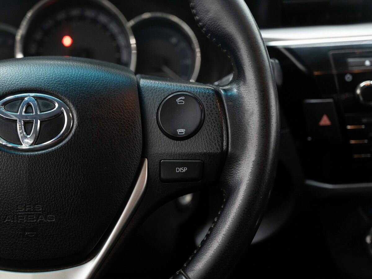 Toyota Corolla с пробегом — 2013 год. Фото: #17