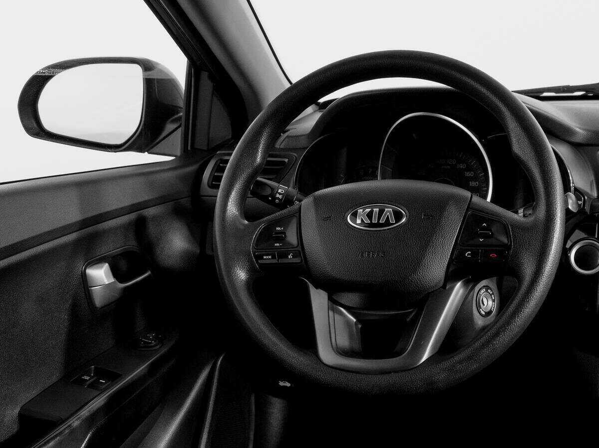 Kia Rio с пробегом — 2013 год. Фото: #13