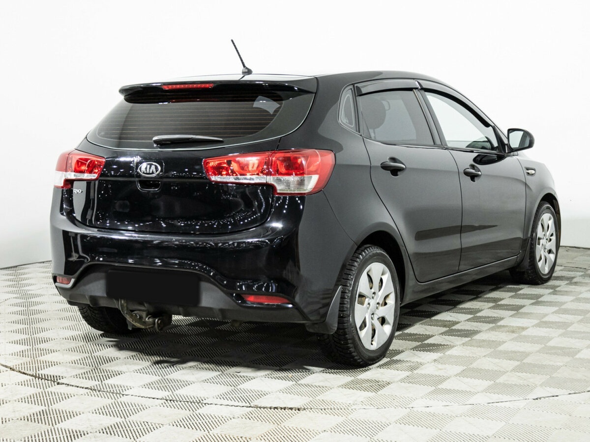 Kia Rio с пробегом — 2015 год. Фото: #4