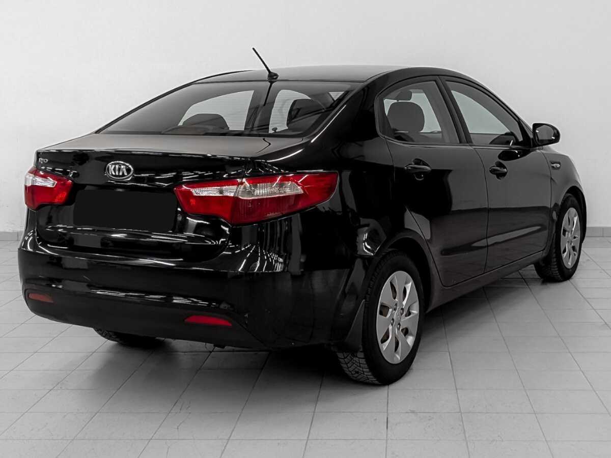 Kia Rio с пробегом — 2013 год. Фото: #4