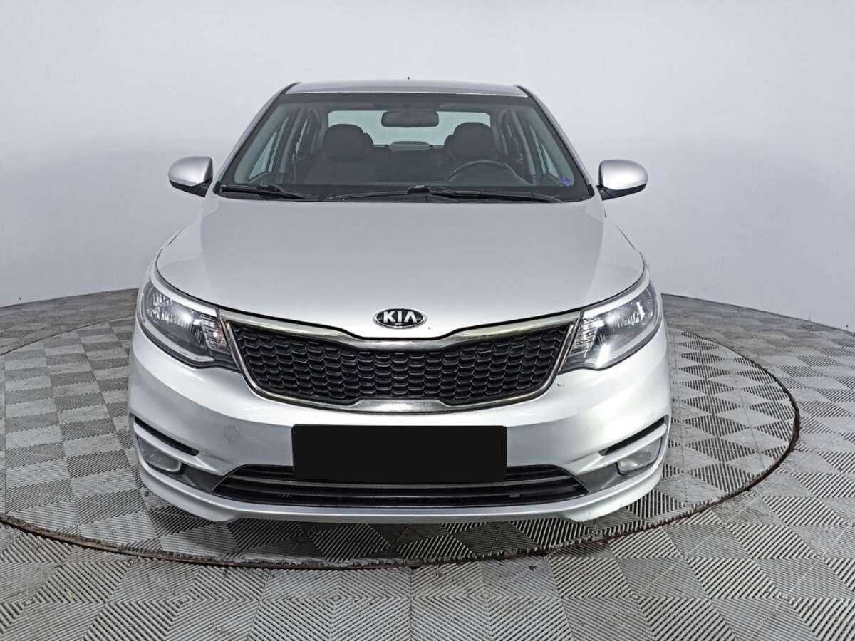 Kia Rio с пробегом — 2015 год. Фото: #1