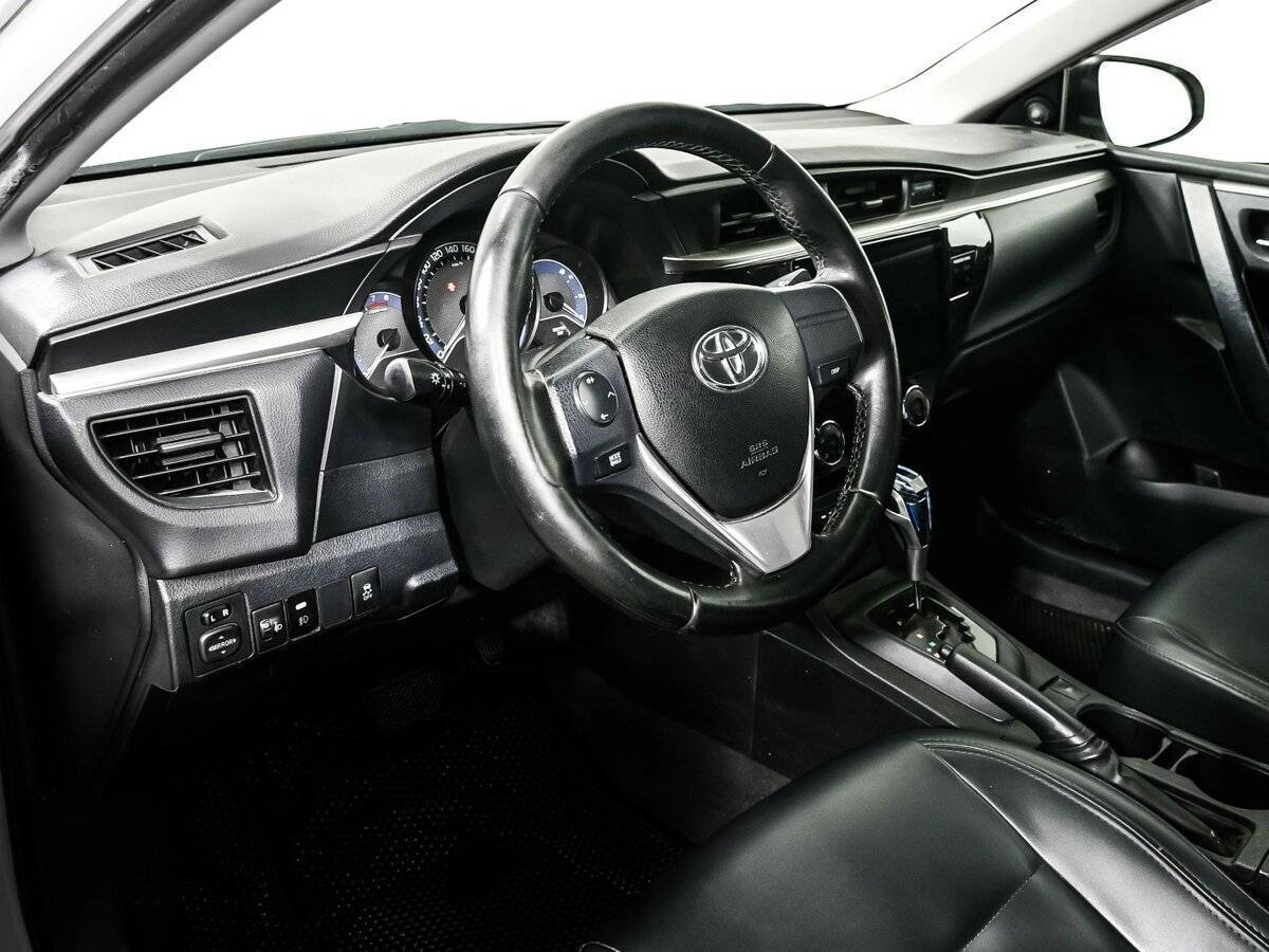 Toyota Corolla с пробегом — 2013 год. Фото: #11