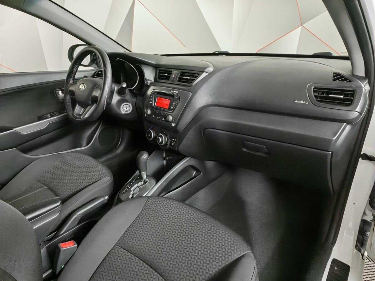 Kia Rio с пробегом — 2013 год. Фото: #8