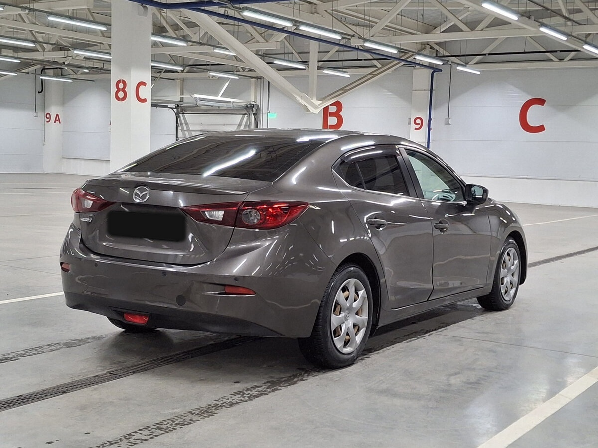 Mazda 3 с пробегом — 2014 год. Фото: #4