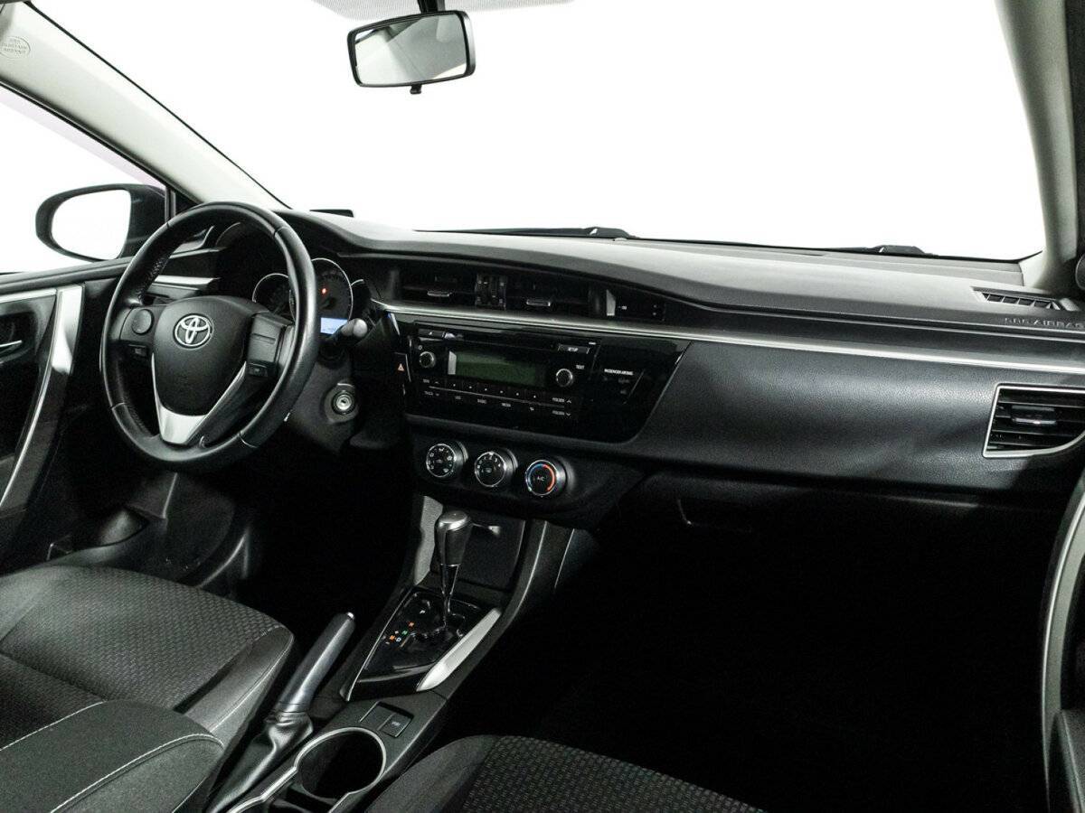 Toyota Corolla с пробегом — 2013 год. Фото: #8