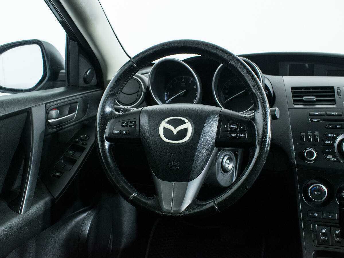 Mazda 3 с пробегом — 2012 год. Фото: #13