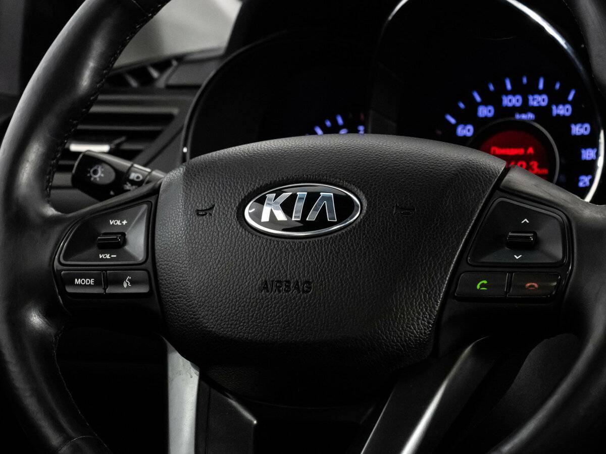 Kia Rio с пробегом — 2014 год. Фото: #10