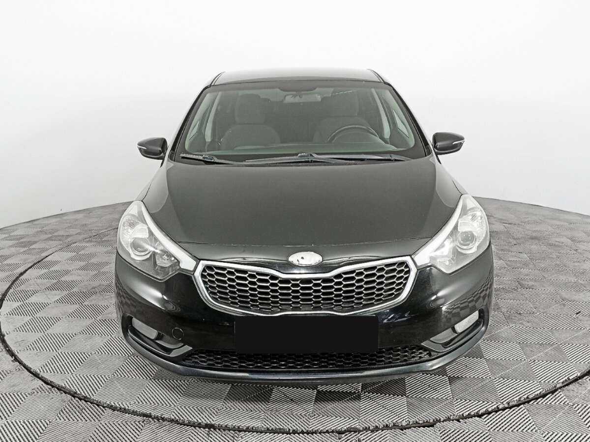 Kia Cerato с пробегом — 2013 год. Фото: #1