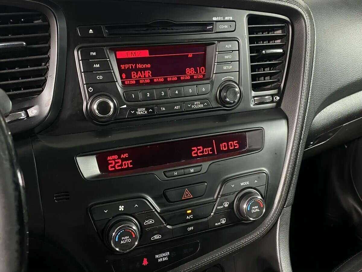 Kia Optima с пробегом — 2013 год. Фото: #11