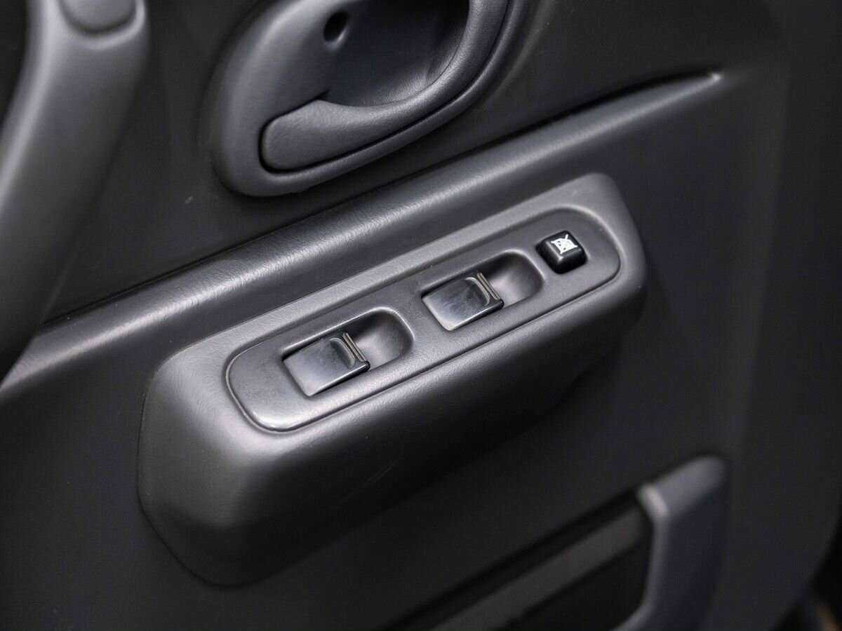 Suzuki Jimny с пробегом — 2012 год. Фото: #12