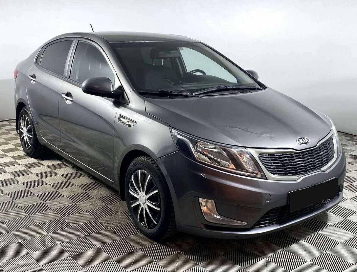 Kia Rio с пробегом — 2013 год. Фото: #2