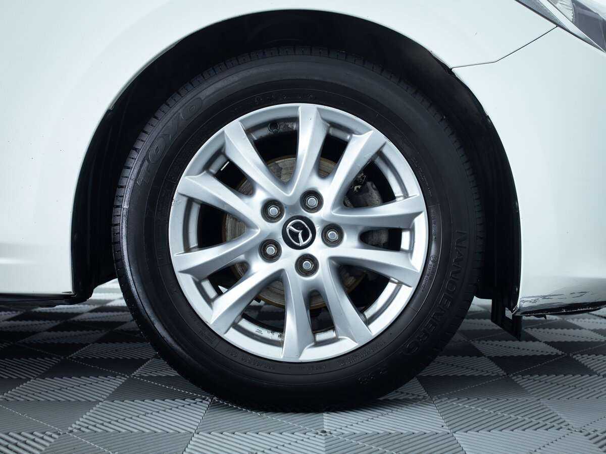 Mazda 3 с пробегом — 2014 год. Фото: #9