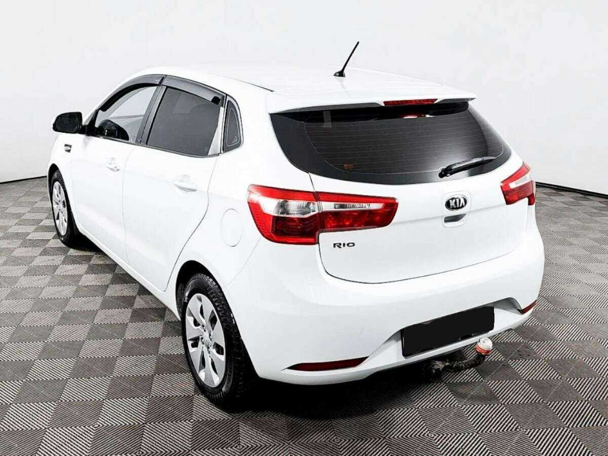 Kia Rio с пробегом — 2014 год. Фото: #6