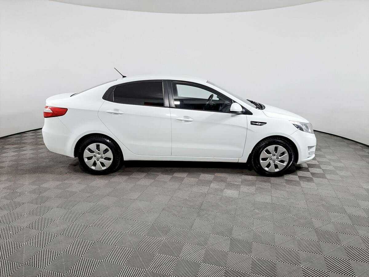 Kia Rio с пробегом — 2013 год. Фото: #3