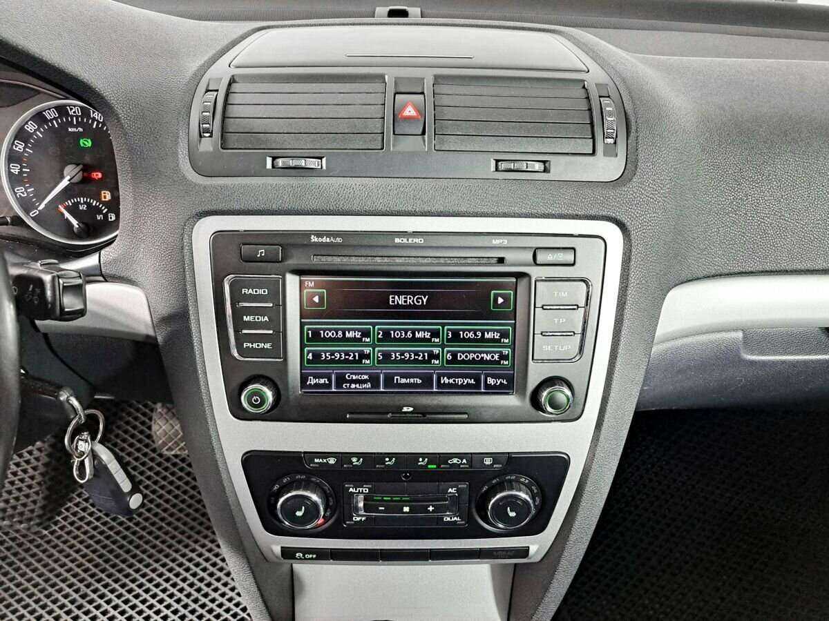 Skoda Octavia с пробегом — 2012 год. Фото: #11