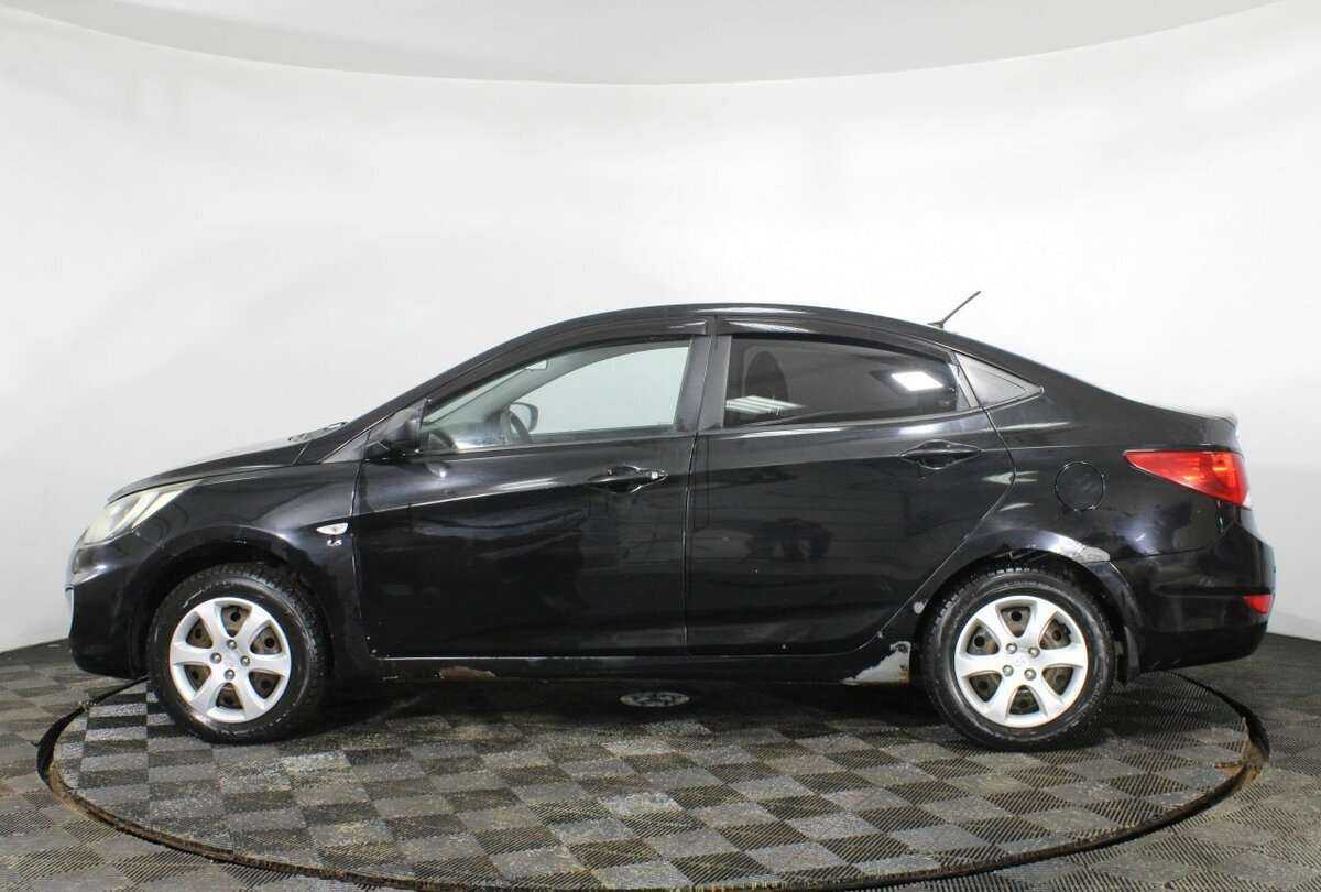 Hyundai Solaris с пробегом — 2013 год. Фото: #7