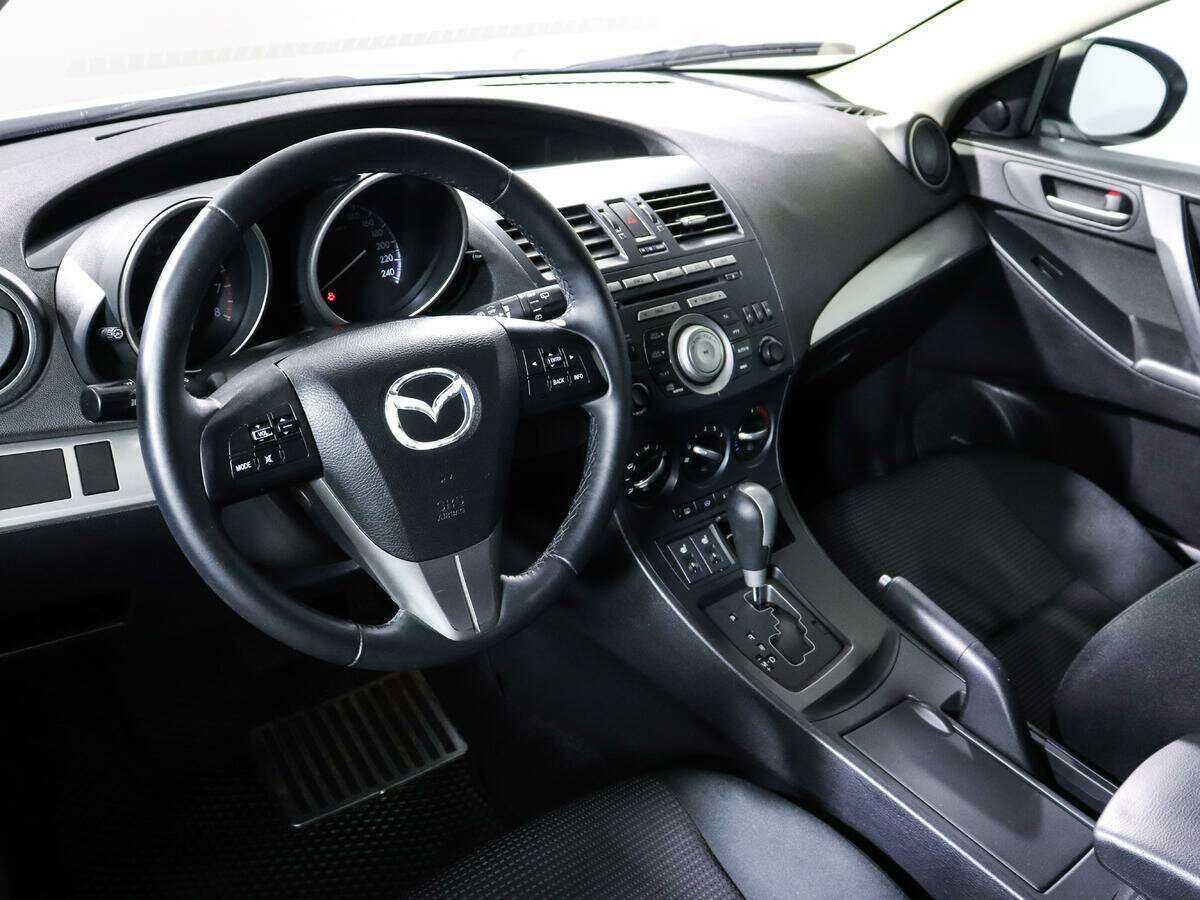 Mazda 3 с пробегом — 2012 год. Фото: #13