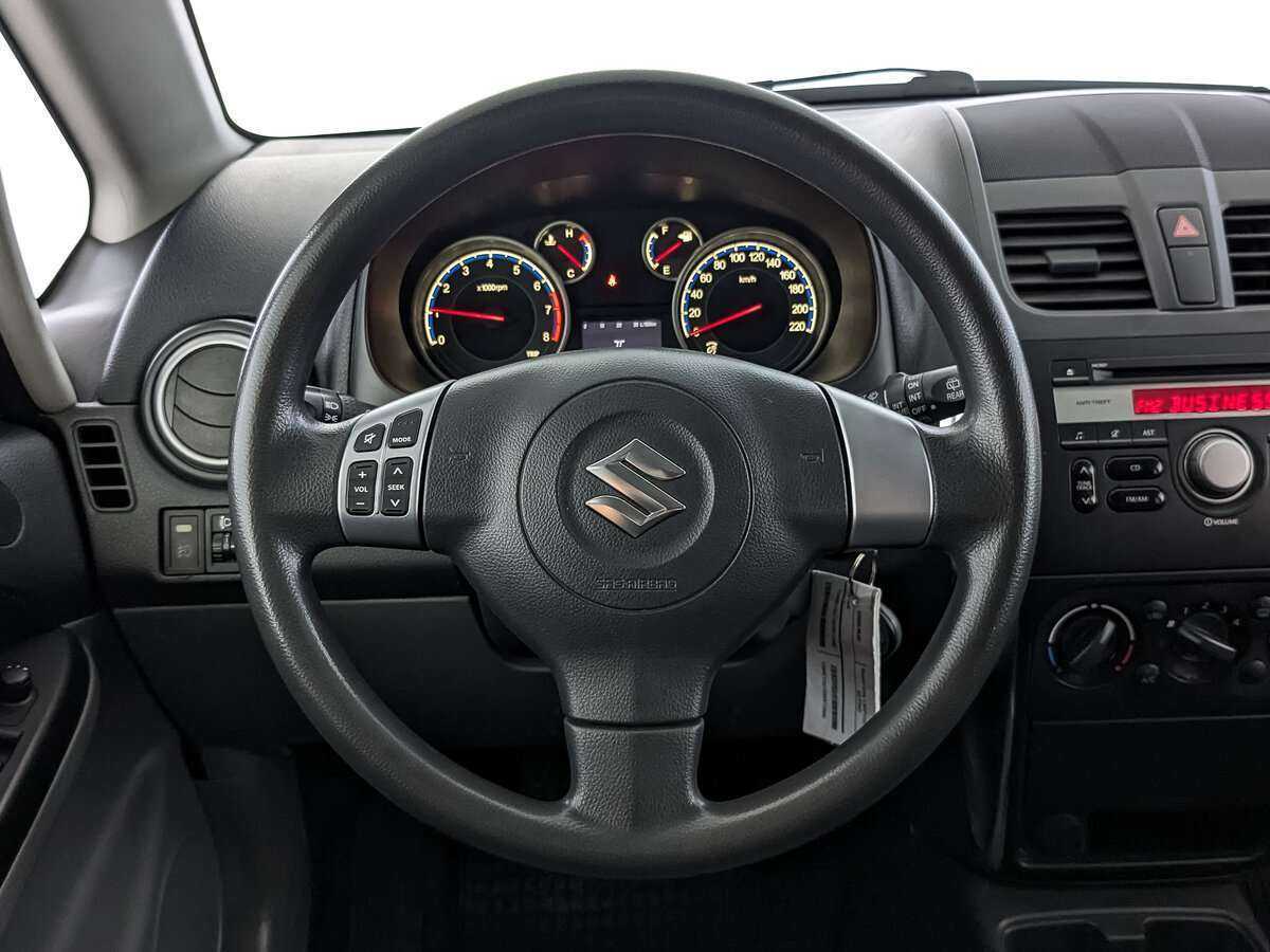 Suzuki SX4 с пробегом — 2014 год. Фото: #17