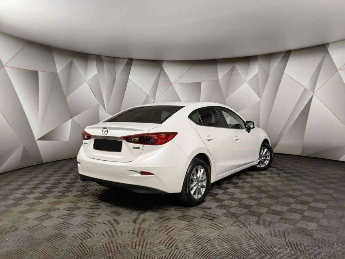 Mazda 3 с пробегом — 2014 год. Фото: #1