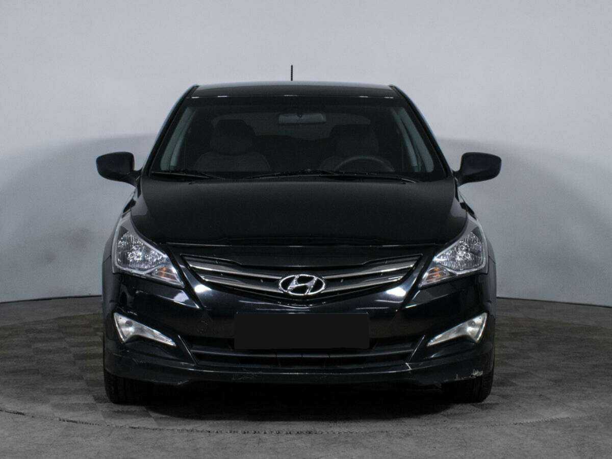 Hyundai Solaris с пробегом — 2014 год. Фото: #1