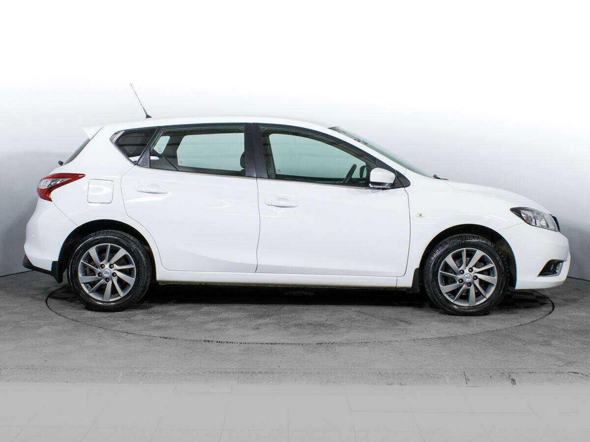 Nissan Tiida с пробегом — 2015 год. Фото: #3