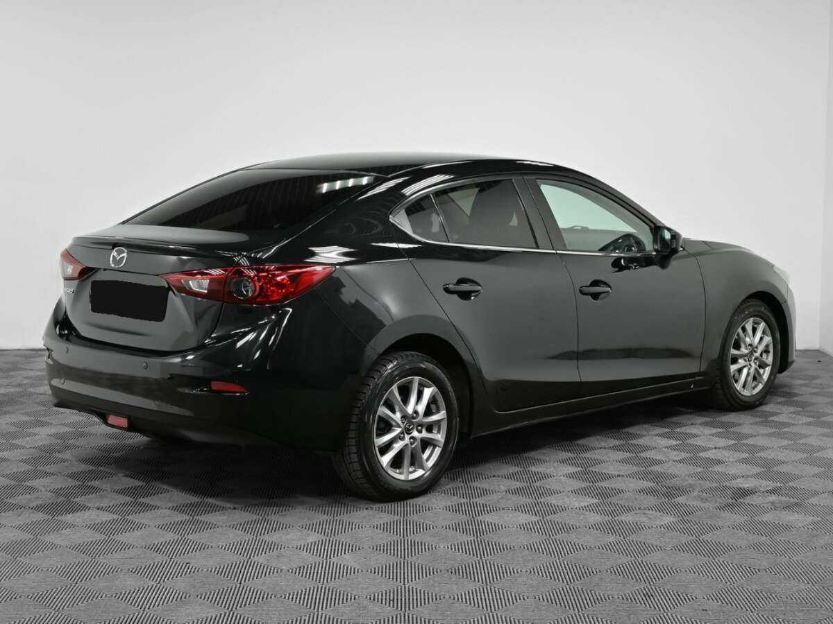 Mazda 3 с пробегом — 2013 год. Фото: #1