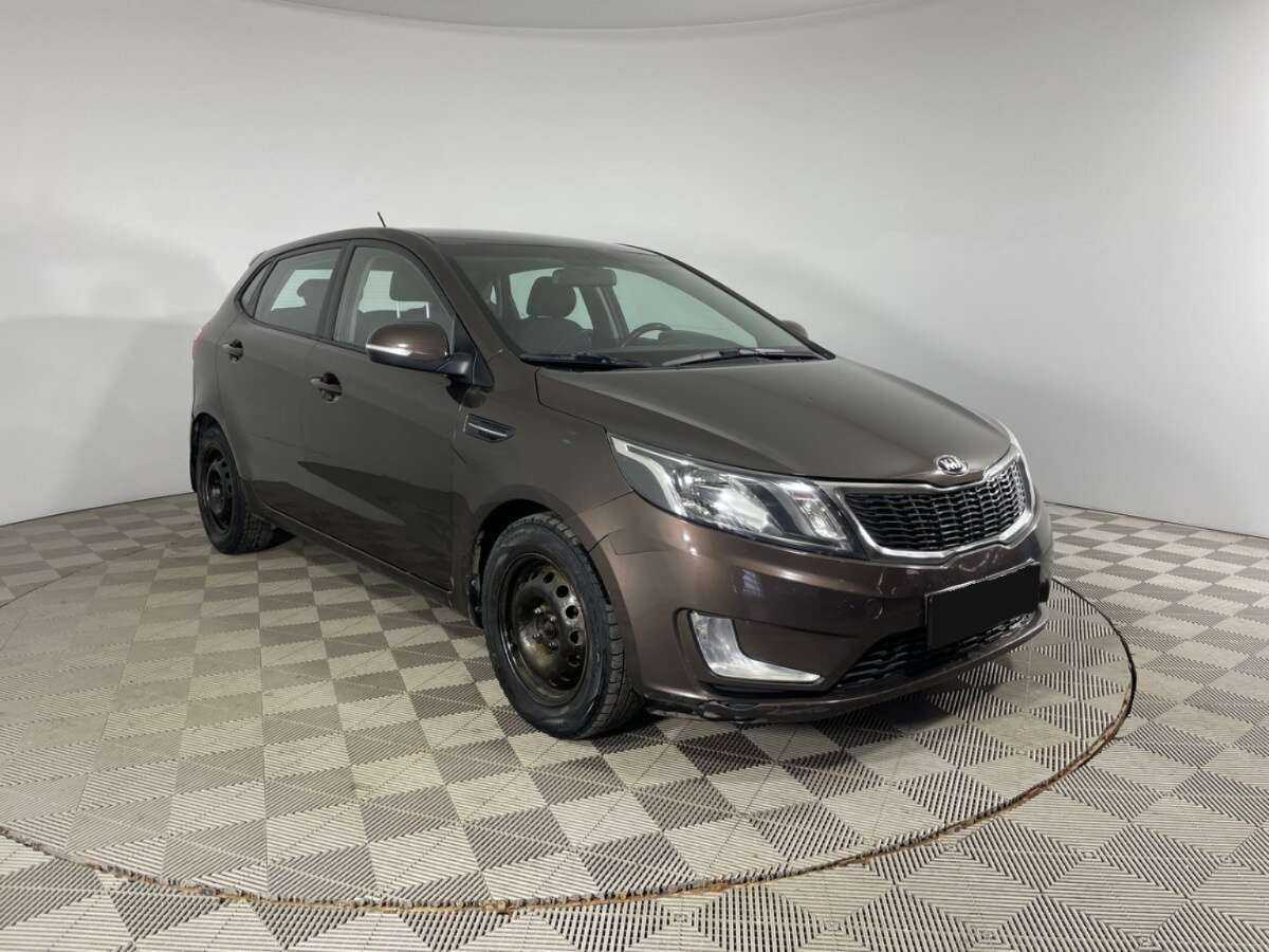 Kia Rio с пробегом — 2014 год. Фото: #2