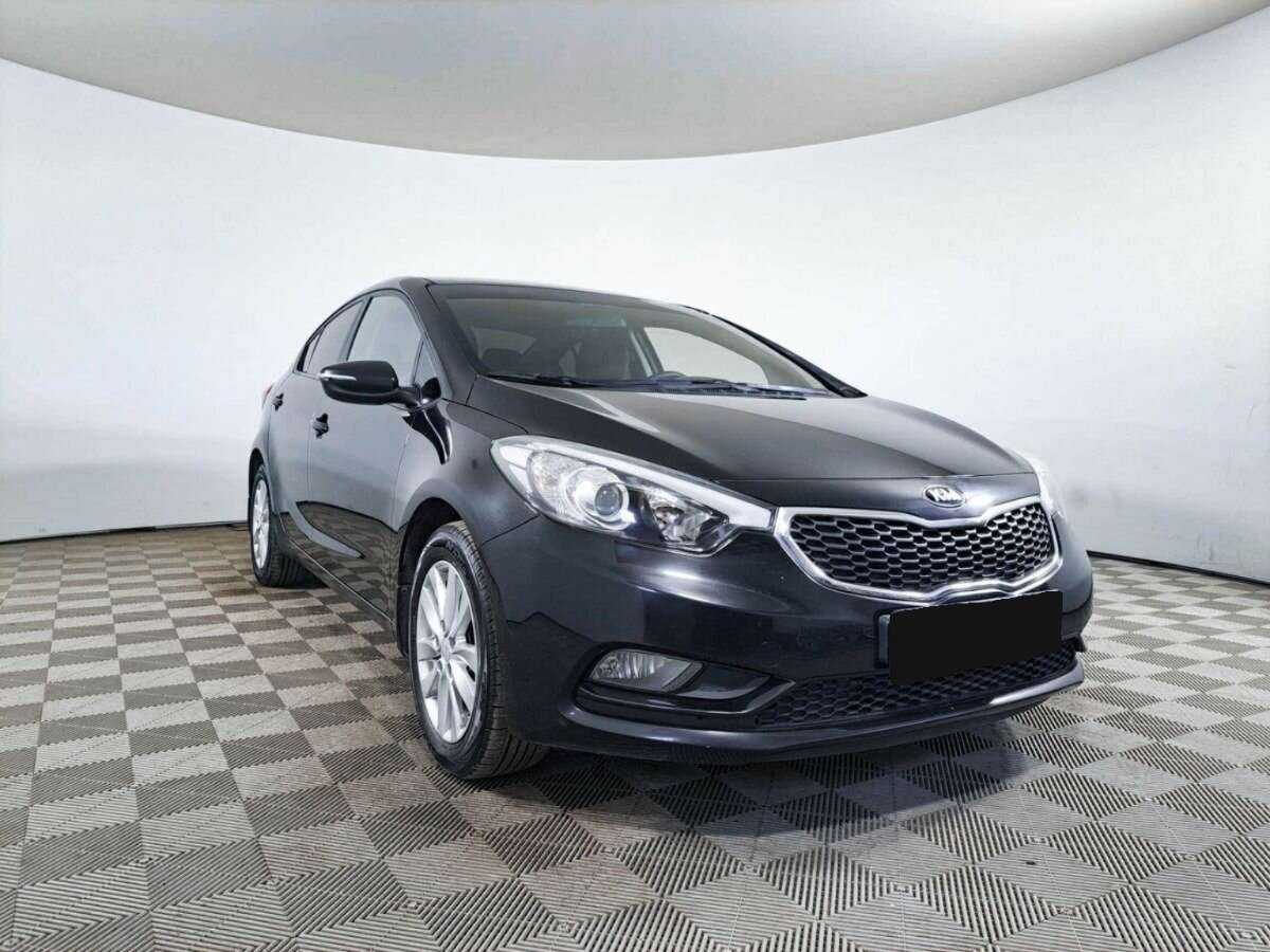 Kia Cerato с пробегом — 2014 год. Фото: #2