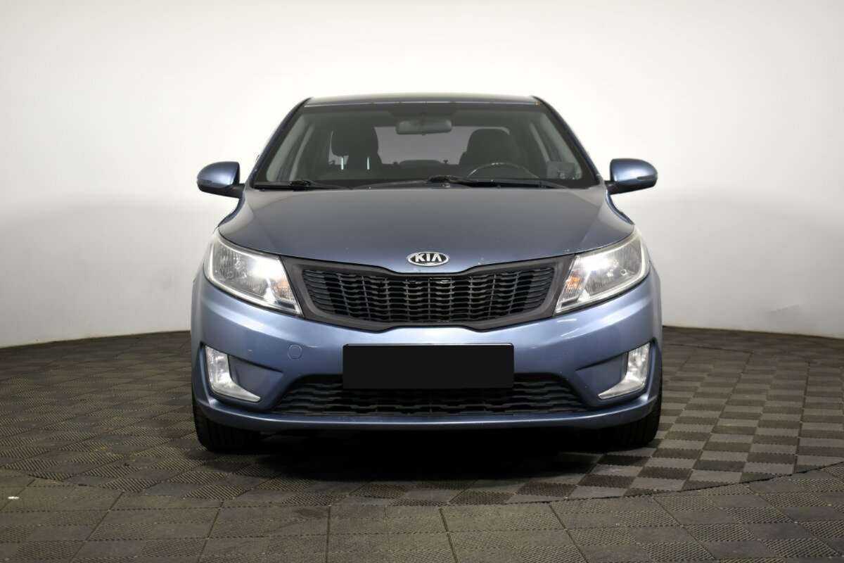 Kia Rio с пробегом — 2013 год. Фото: #1