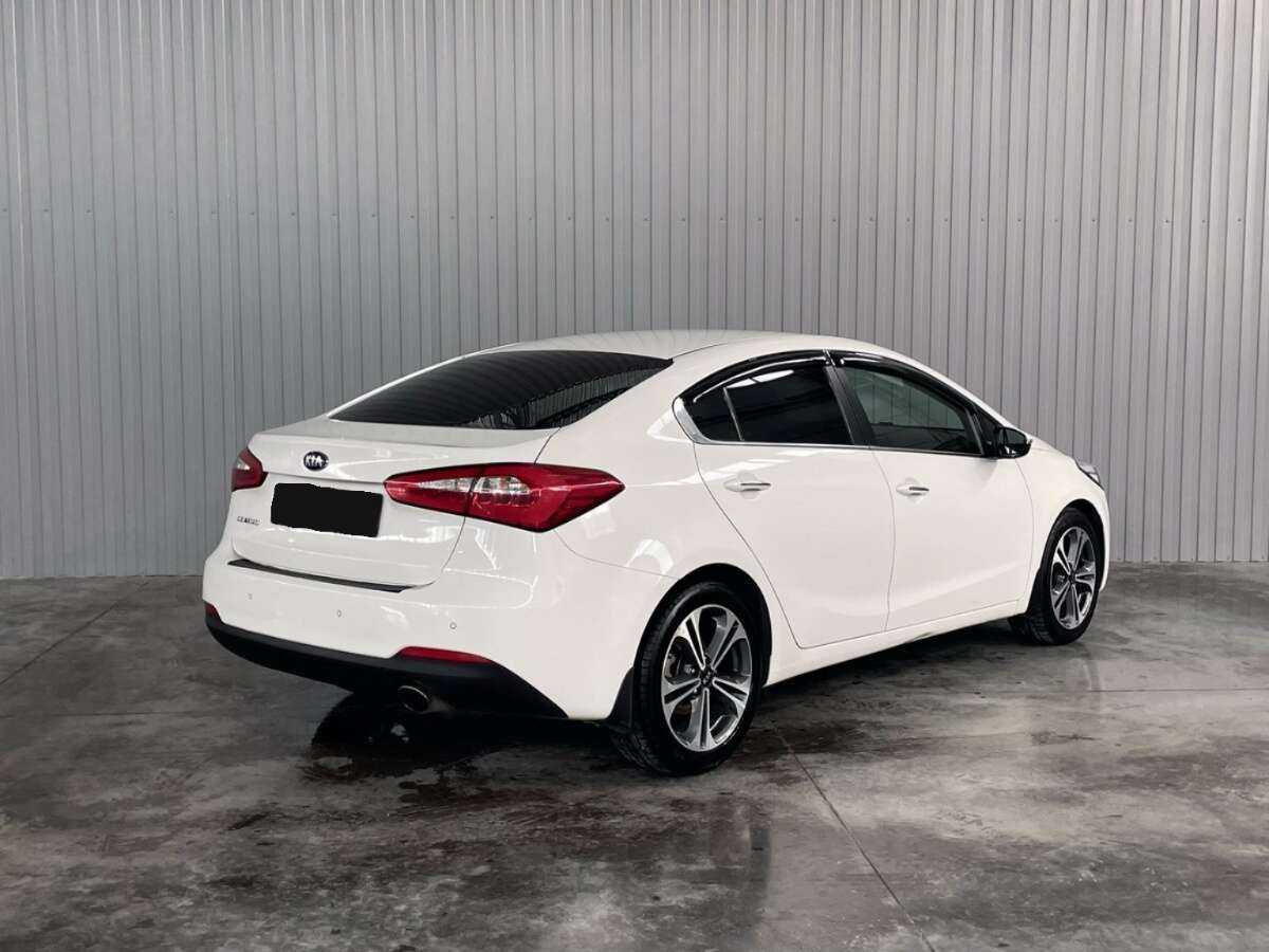 Kia Cerato с пробегом — 2014 год. Фото: #4