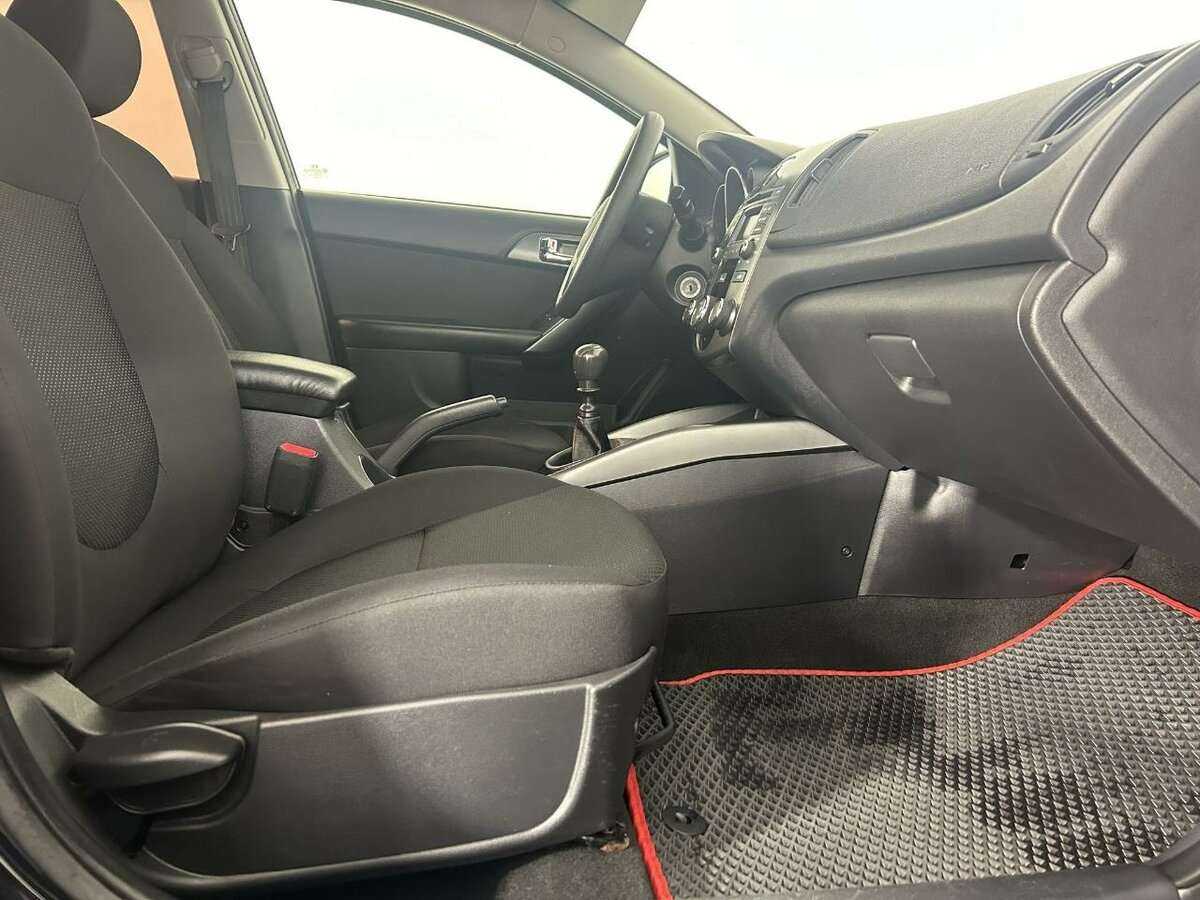 Kia Cerato с пробегом — 2013 год. Фото: #11