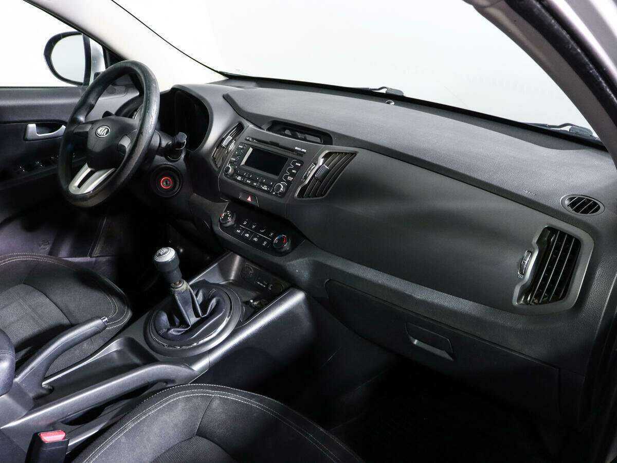 Kia Sportage с пробегом — 2012 год. Фото: #6