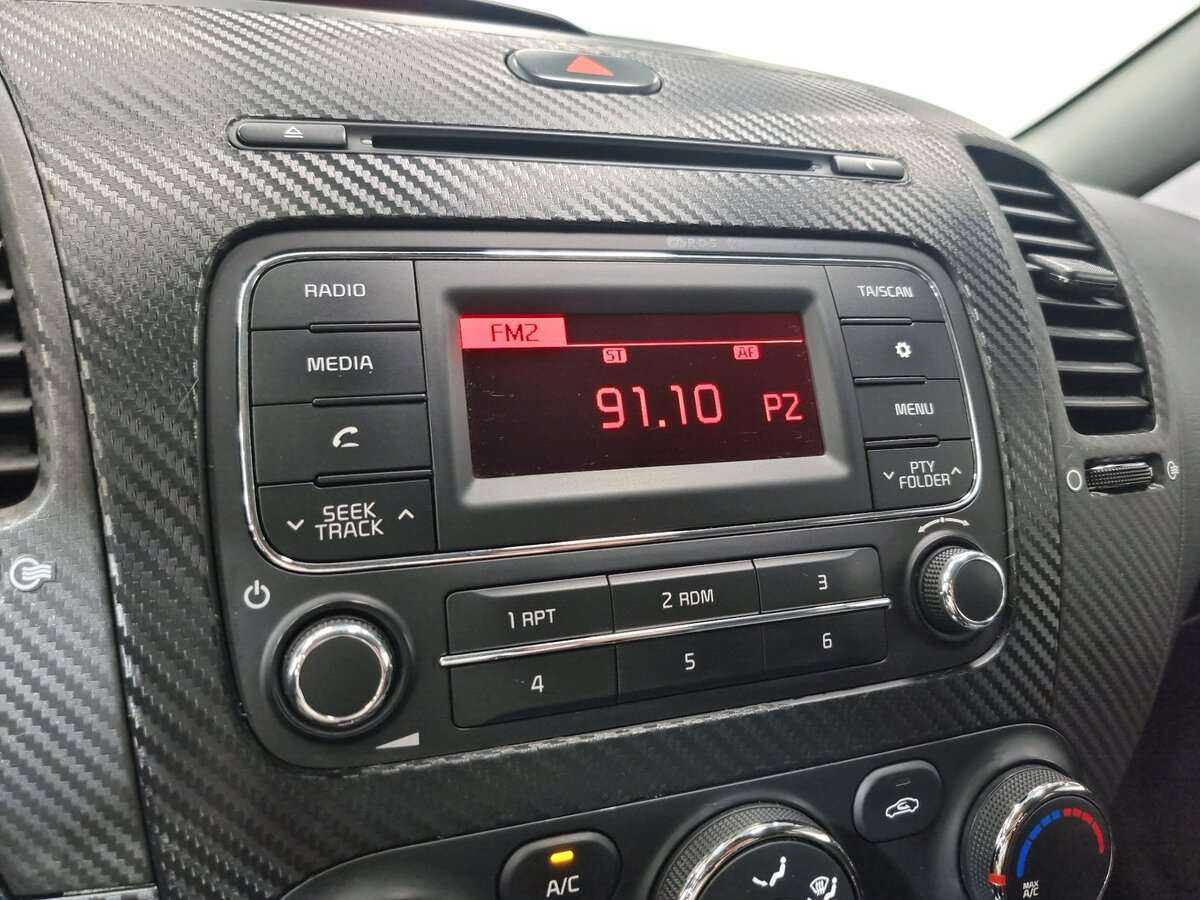 Kia Cerato с пробегом — 2014 год. Фото: #14