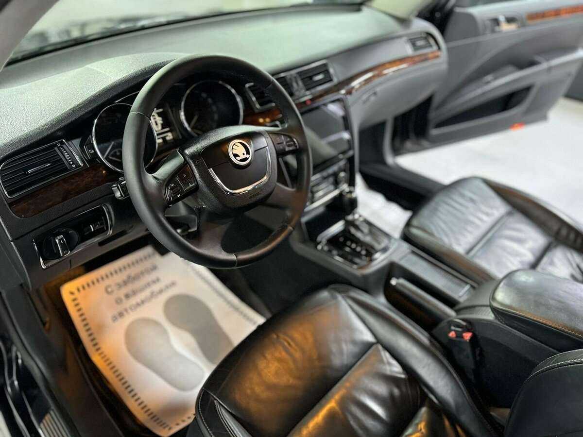 Skoda Superb с пробегом — 2013 год. Фото: #8