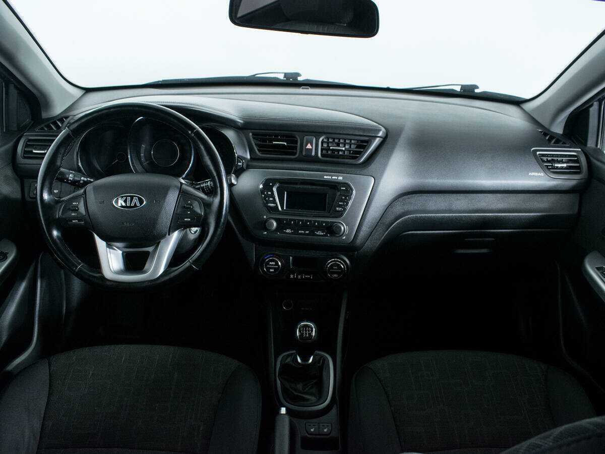 Kia Rio с пробегом — 2013 год. Фото: #11