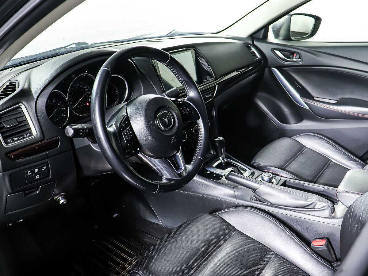 Mazda 6 с пробегом — 2014 год. Фото: #12