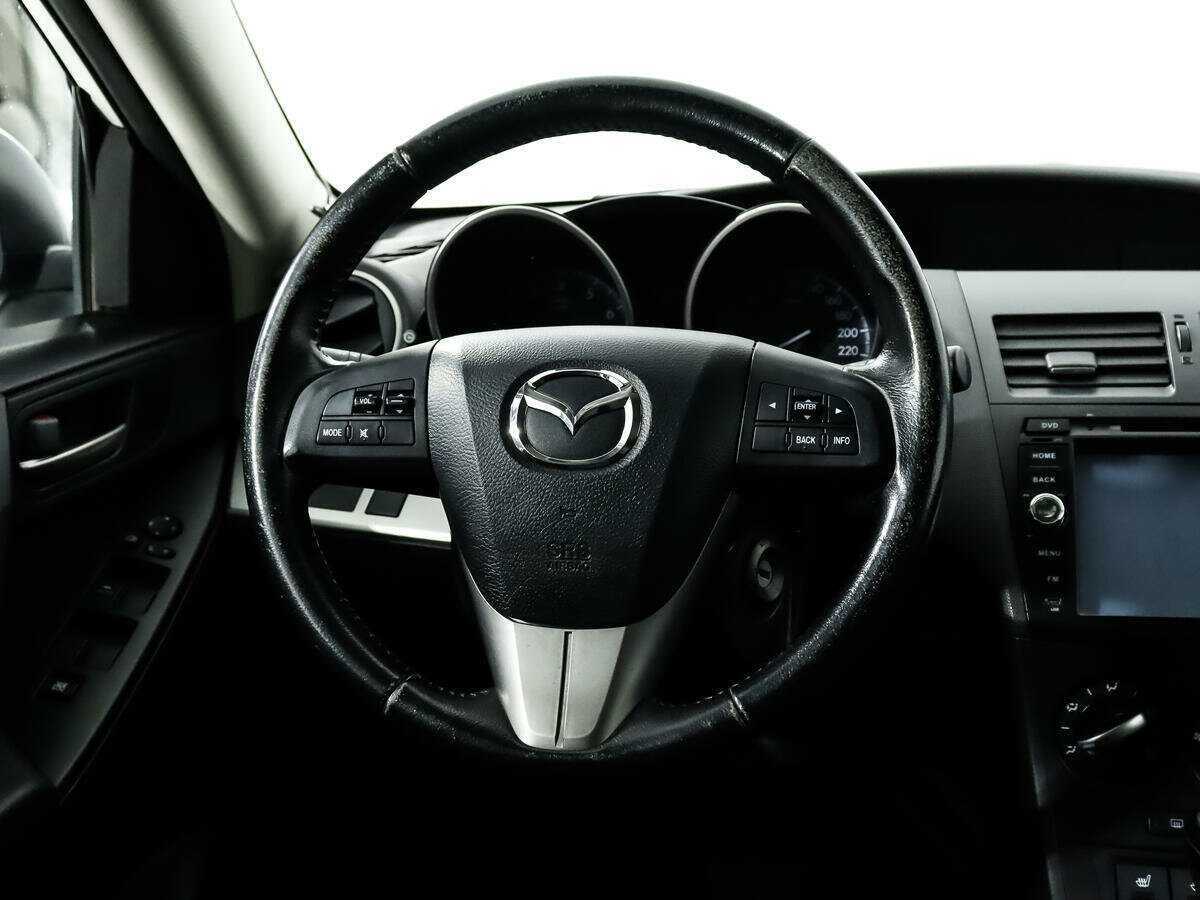 Mazda 3 с пробегом — 2013 год. Фото: #16