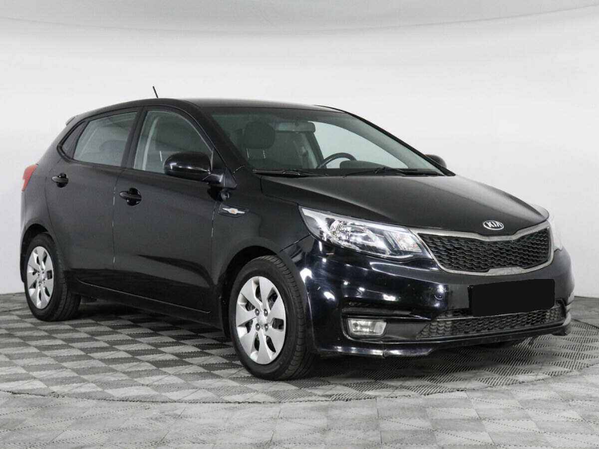 Kia Rio с пробегом — 2015 год. Фото: #1