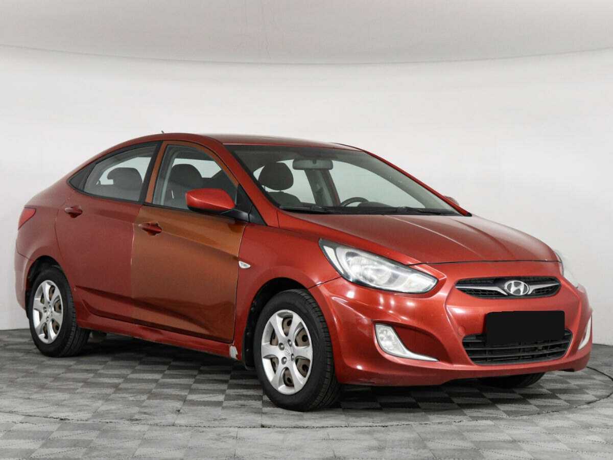 Hyundai Solaris с пробегом — 2012 год. Фото: #1