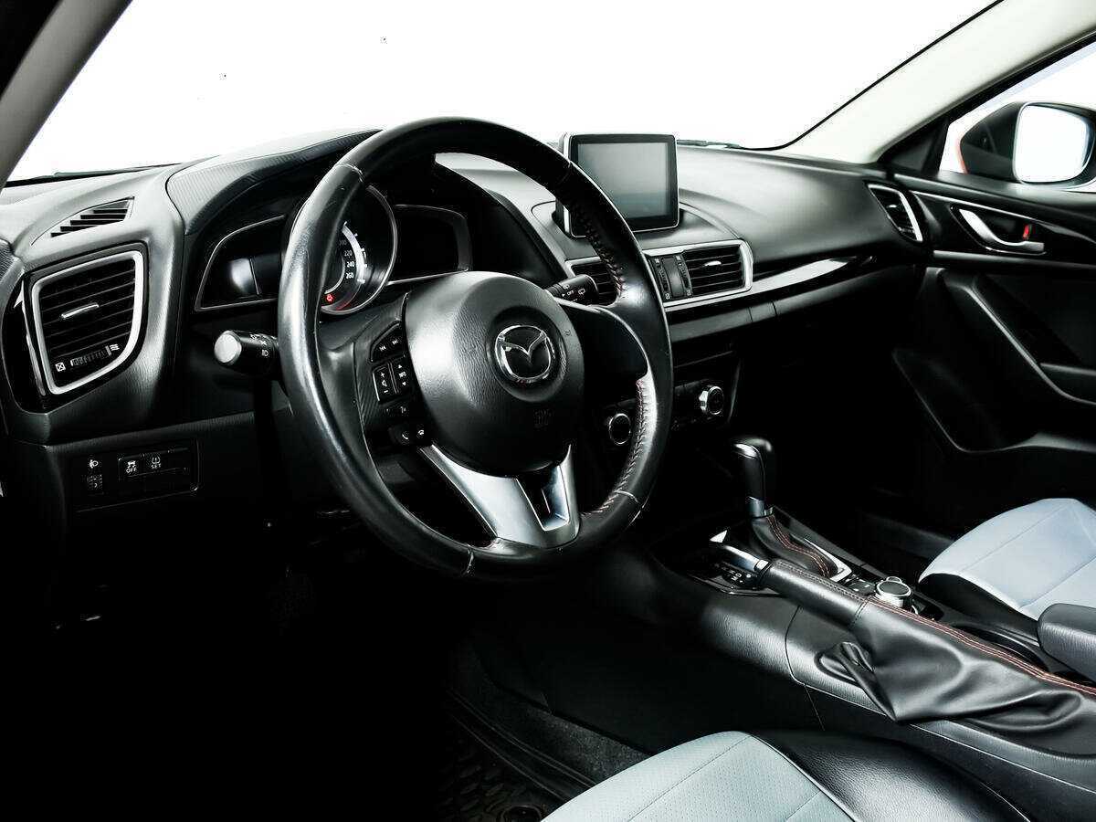 Mazda 3 с пробегом — 2014 год. Фото: #12