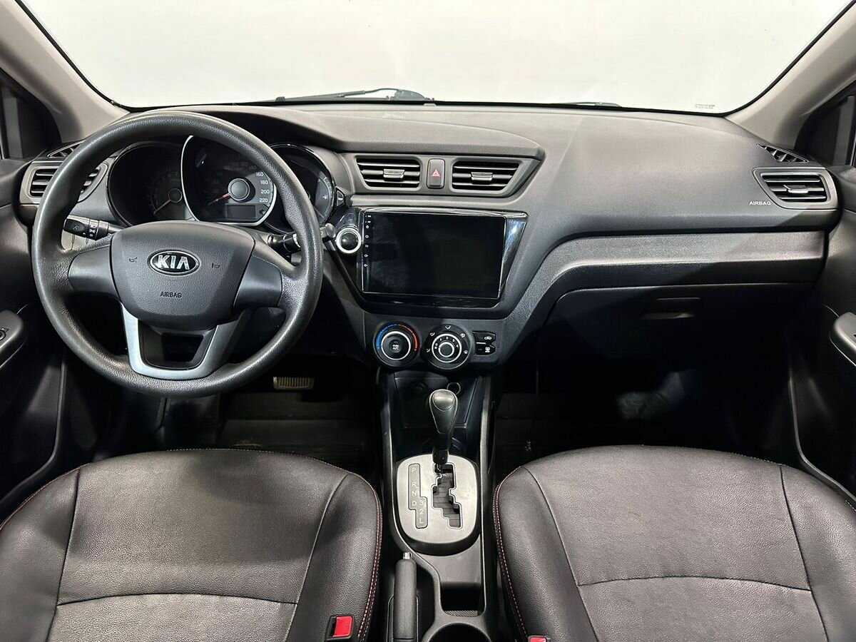 Kia Rio с пробегом — 2013 год. Фото: #9