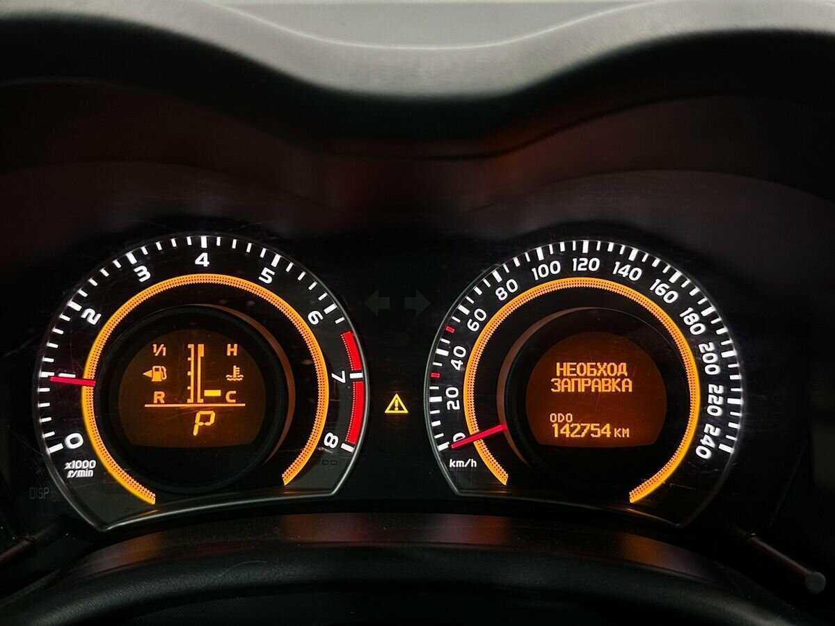 Toyota Corolla с пробегом — 2012 год. Фото: #11