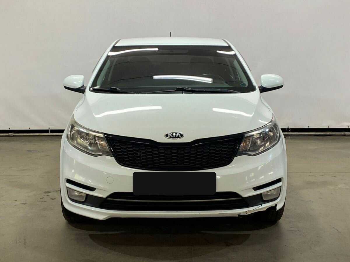 Kia Rio с пробегом — 2015 год. Фото: #1