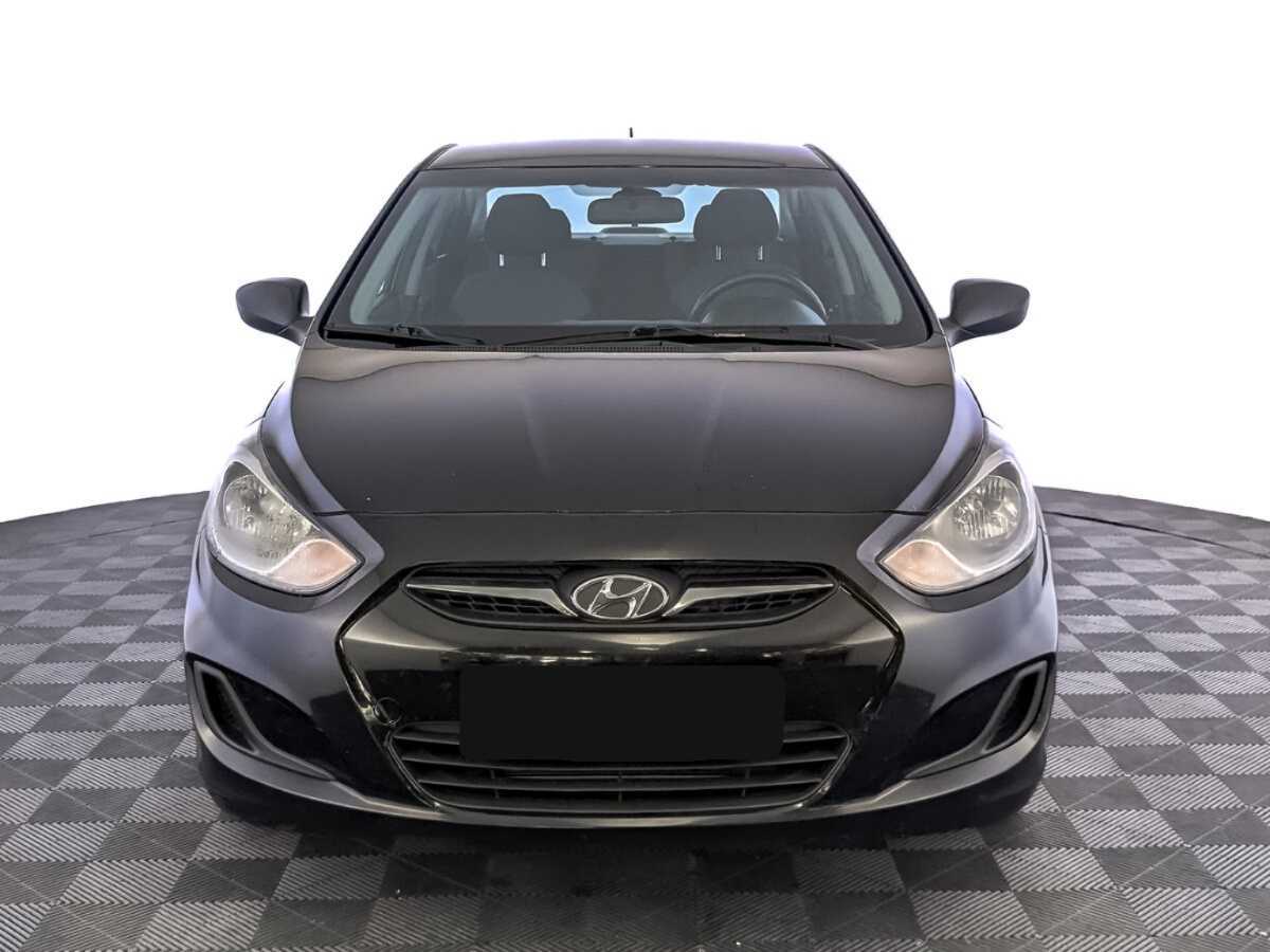 Hyundai Solaris с пробегом — 2013 год. Фото: #1