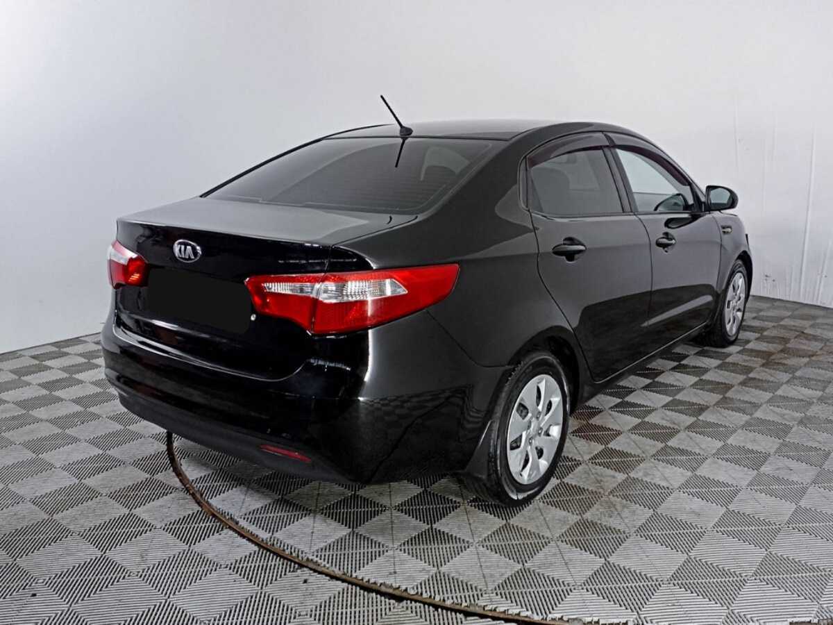 Kia Rio с пробегом — 2014 год. Фото: #4