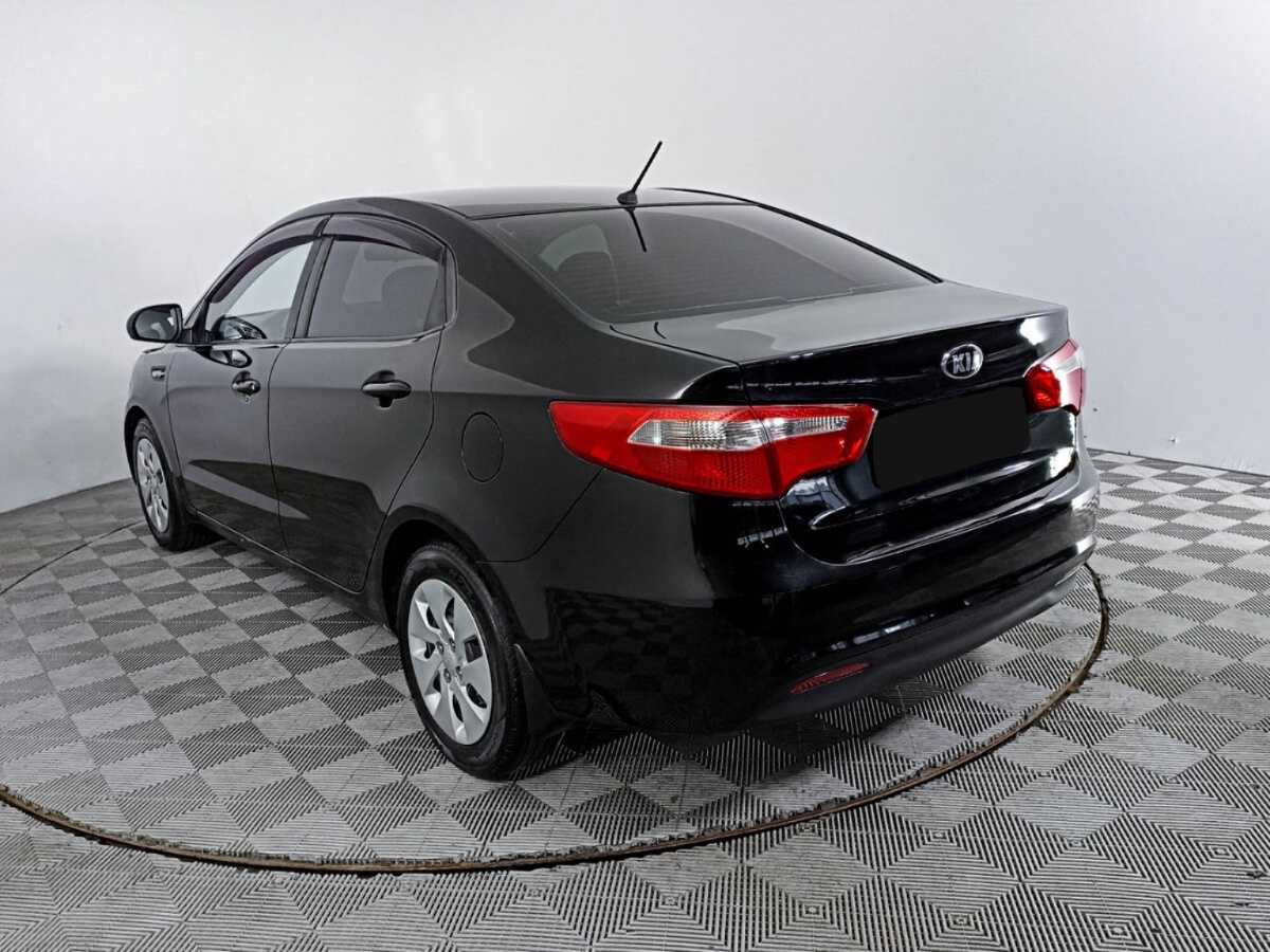 Kia Rio с пробегом — 2014 год. Фото: #6