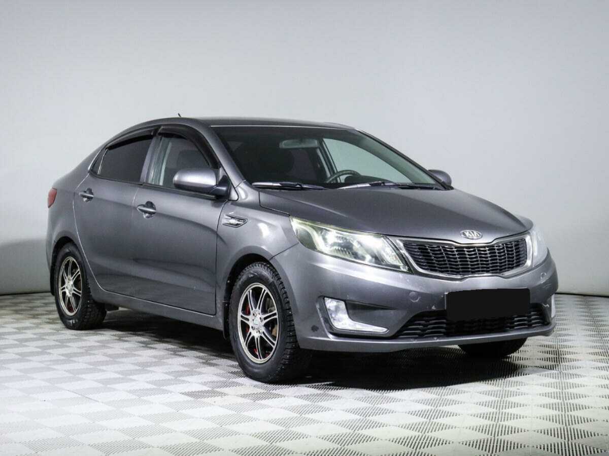 Kia Rio с пробегом — 2013 год. Фото: #2