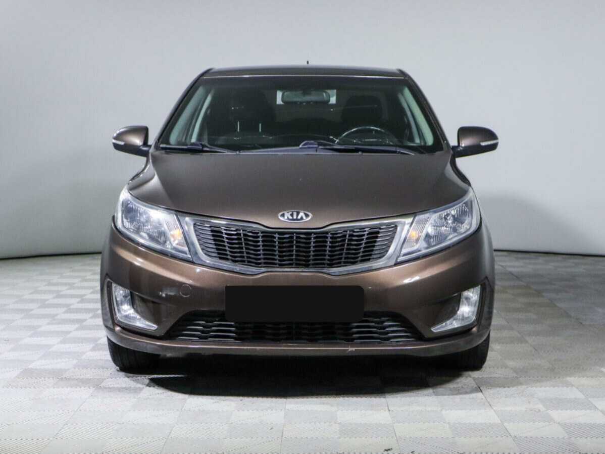 Kia Rio с пробегом — 2014 год. Фото: #1