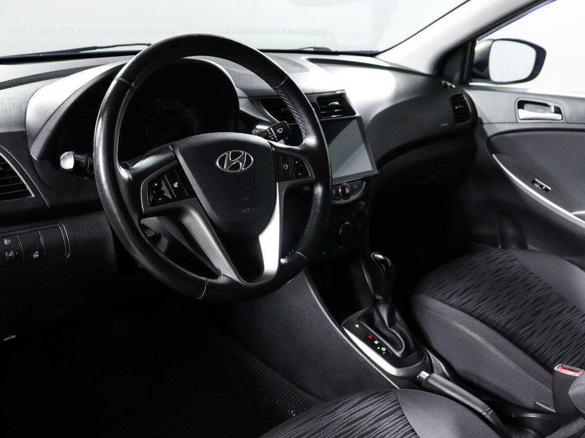 Hyundai Solaris с пробегом — 2014 год. Фото: #11